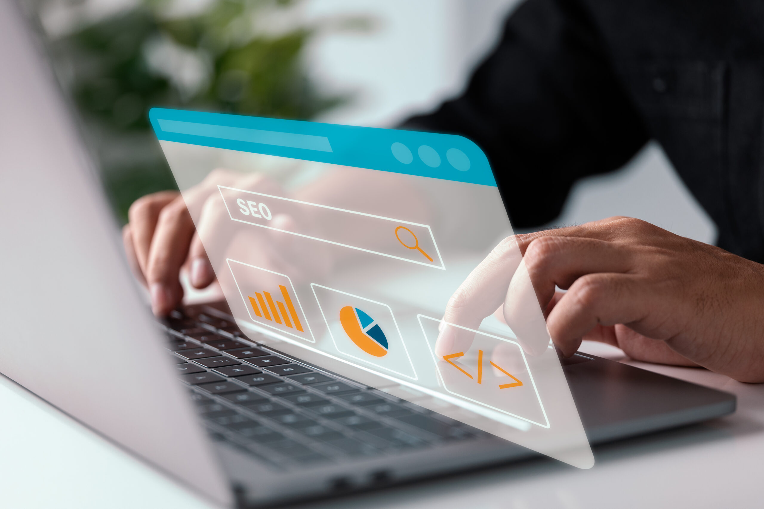 A person works on a laptop with graphics related to BCW  marketing superimposed over the image.