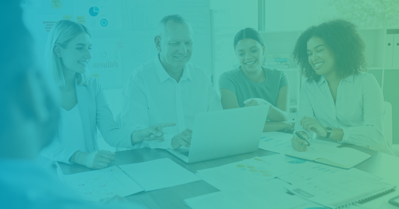 Group of BCW  marketers analyzing content performance on a laptop